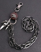 Brown cowhide eagle claw trousers chain gun black