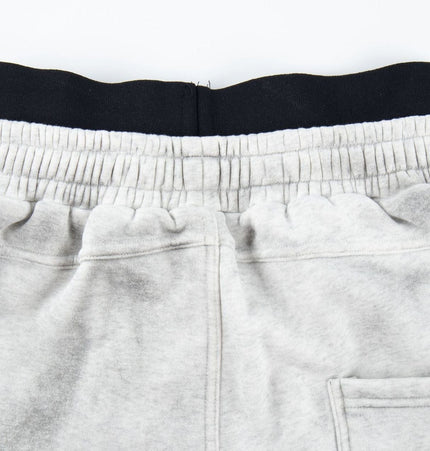 TALKLESSFASHION Fall 2025 American high street dirty and worn letter double waist sweatpants for men and women with a sense of design scimitar wide-leg pants