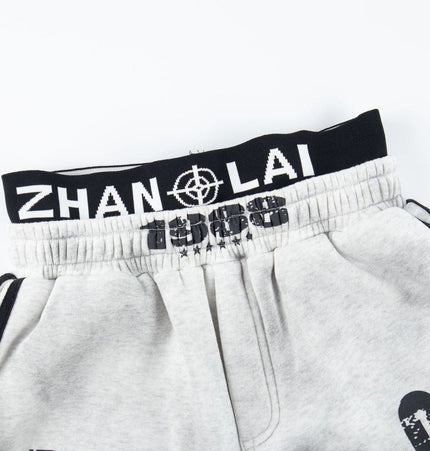 TALKLESSFASHION Fall 2025 American high street dirty and worn letter double waist sweatpants for men and women with a sense of design scimitar wide-leg pants